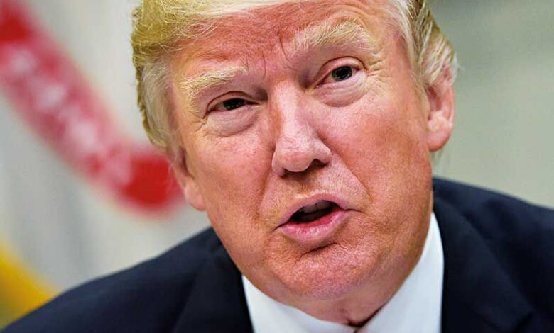 Donald Trump speaking during a political event as US court blocks controversial compensation fund proposal