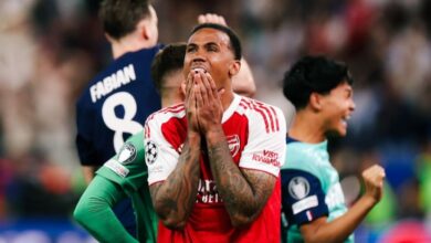 Arsenal players react after losing the Champions League final to PSG following a dramatic penalty shootout defeat.