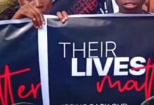 Crowd of protesters in Ibadan, Oyo State holding placards demanding government action against insecurity and kidnappings in Nigeria.